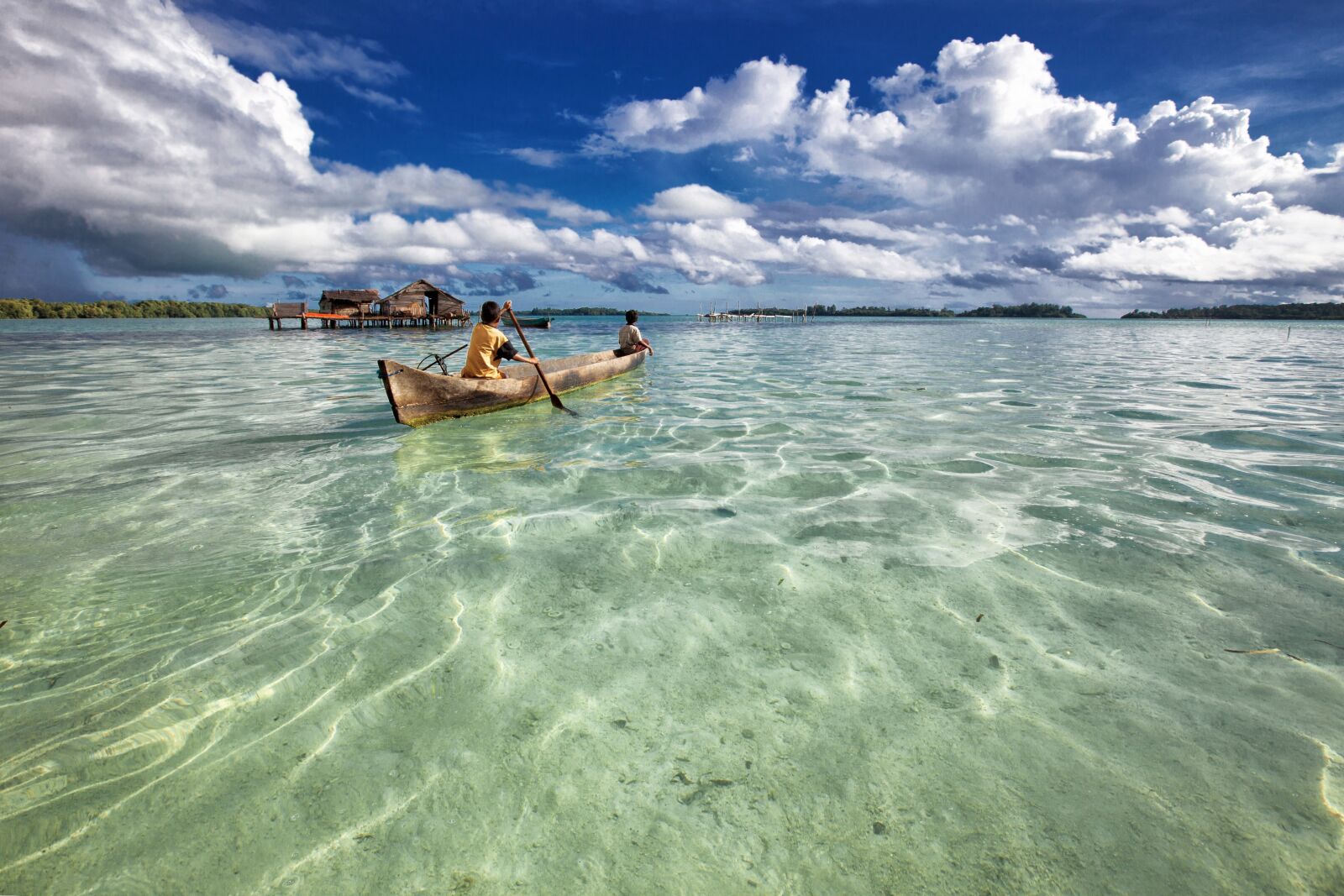 Canon EOS 5D Mark II sample photo. Lagoon, dugout canoe, paddling photography