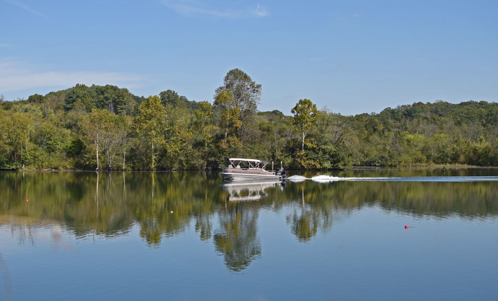 Nikon D3300 sample photo. Motor-boating fisherman, lake, nature photography