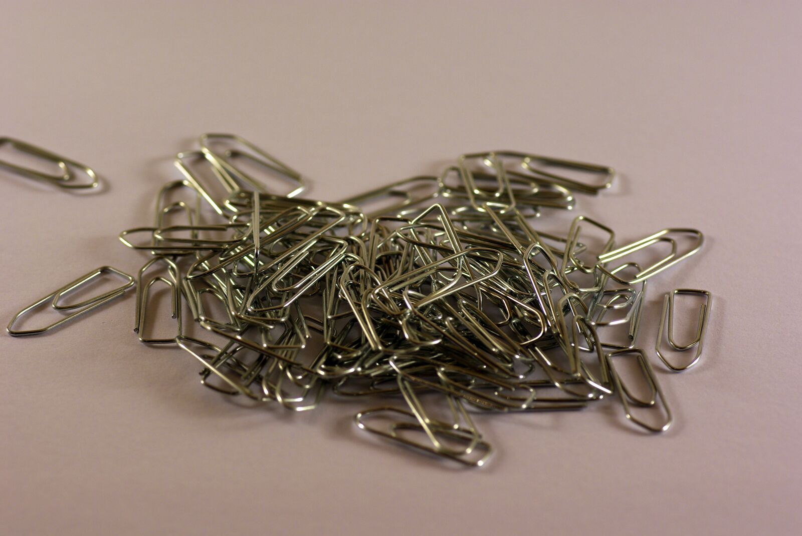 Pentax K10D sample photo. Paperclip, pile, many photography