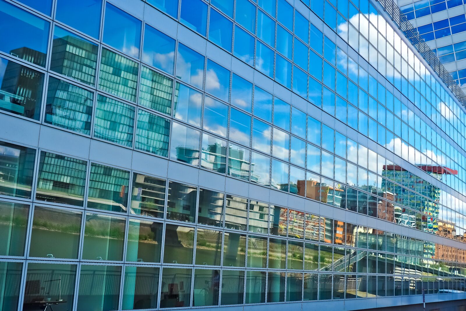 Olympus OM-D E-M10 sample photo. Architecture, glass, building photography