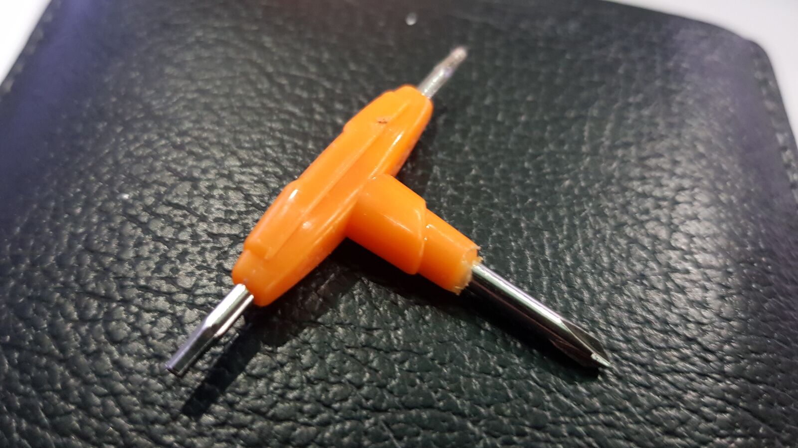 Samsung Galaxy S8 sample photo. Leather, multifunction, orange, screwdriver photography