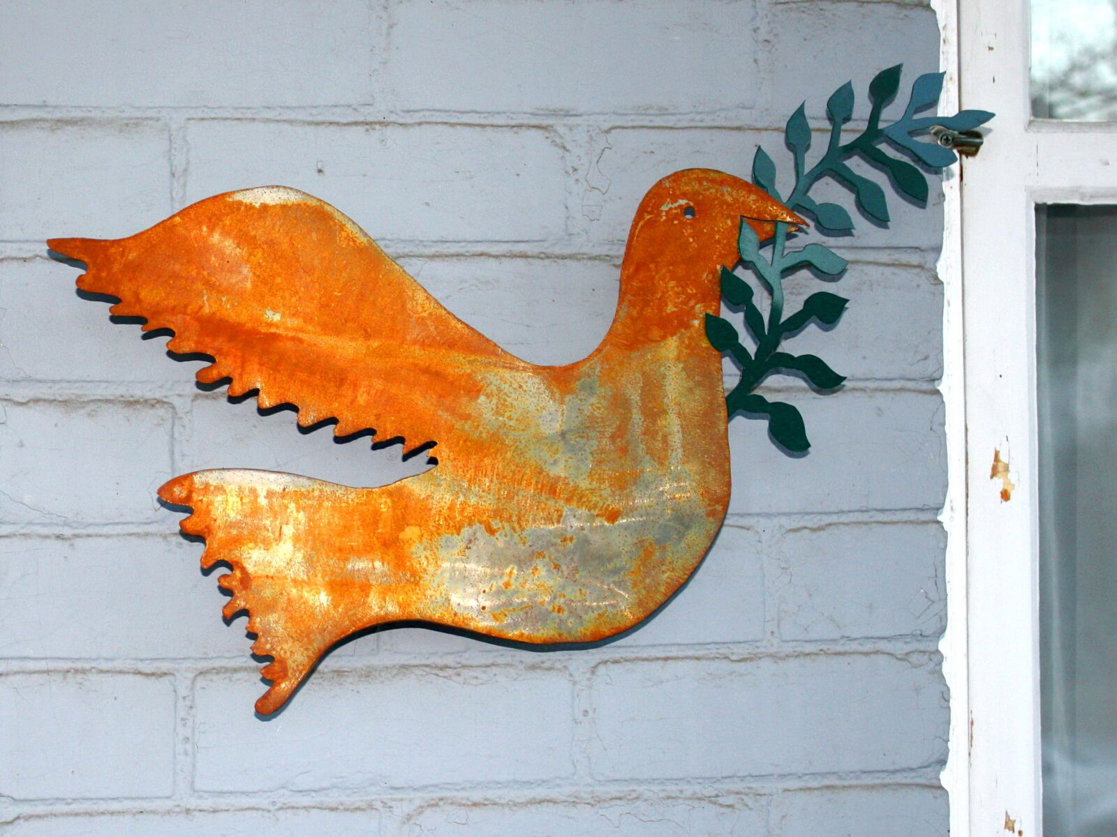 f/3.5-5.6 IS sample photo. Metal ornament, rust, exterior photography