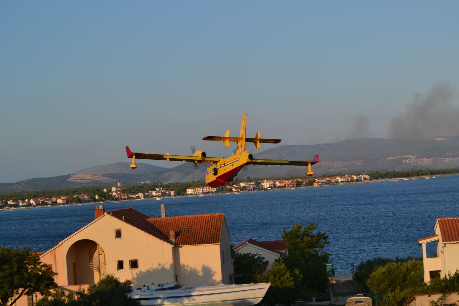 Nikon D3100 sample photo. Canadair firefighting plane, croatia photography