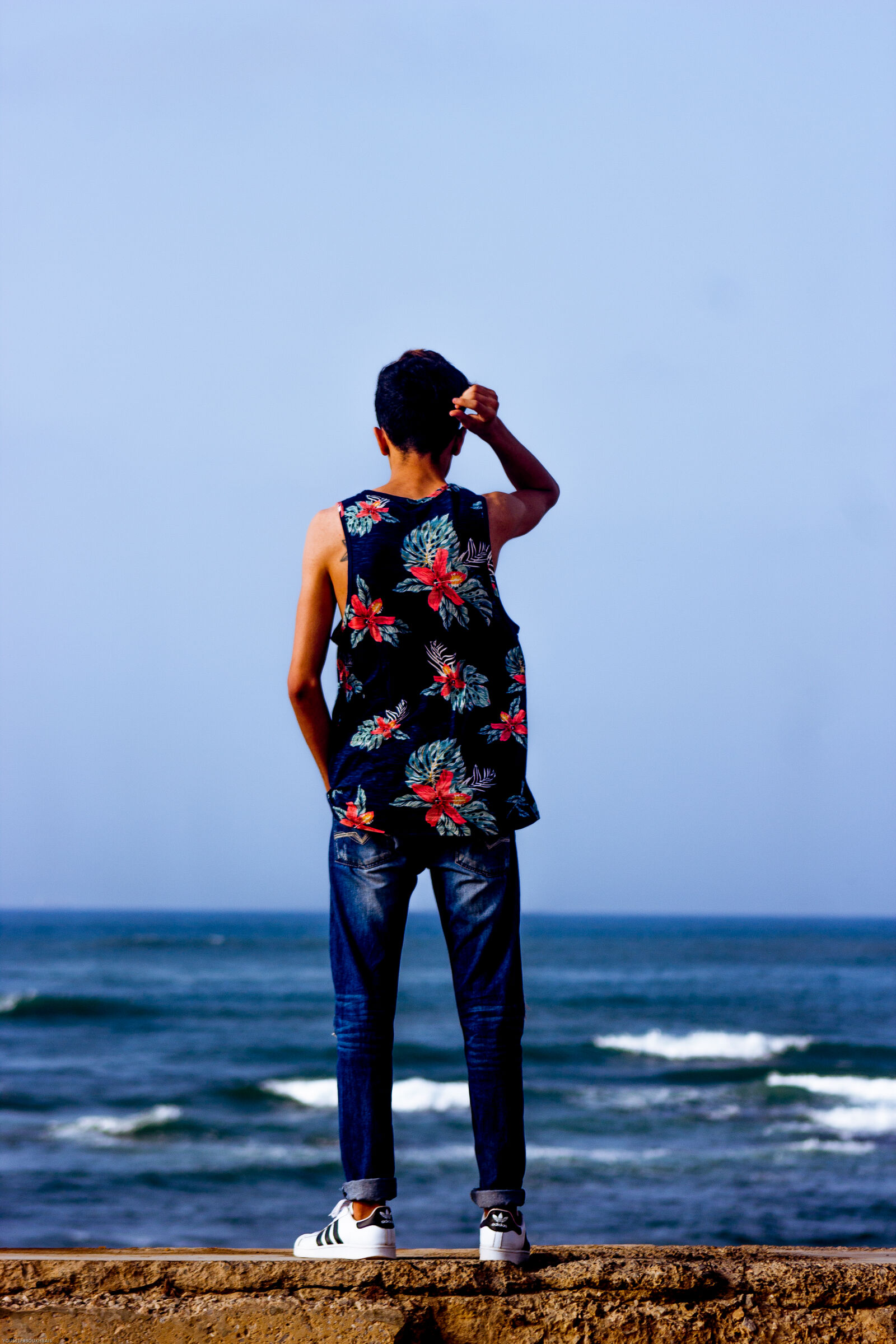 Canon EF 75-300mm f/4-5.6 sample photo. Blue, blue, sky, boy photography