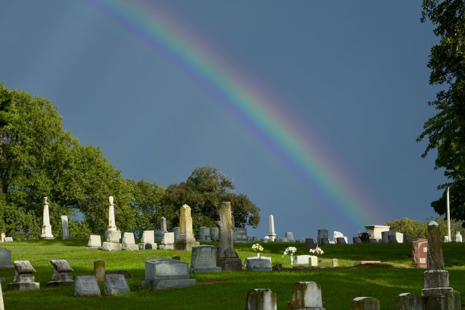Sony Cyber-shot DSC-RX10 III sample photo. Rainbow, cemetery, sky photography