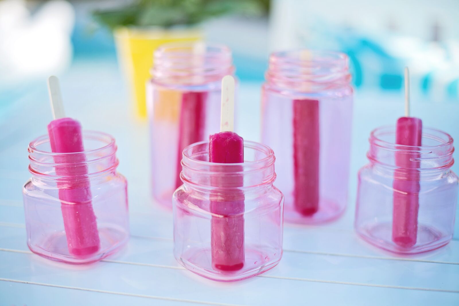 Canon EF 50mm F1.4 USM sample photo. Popsicles, pink, red photography