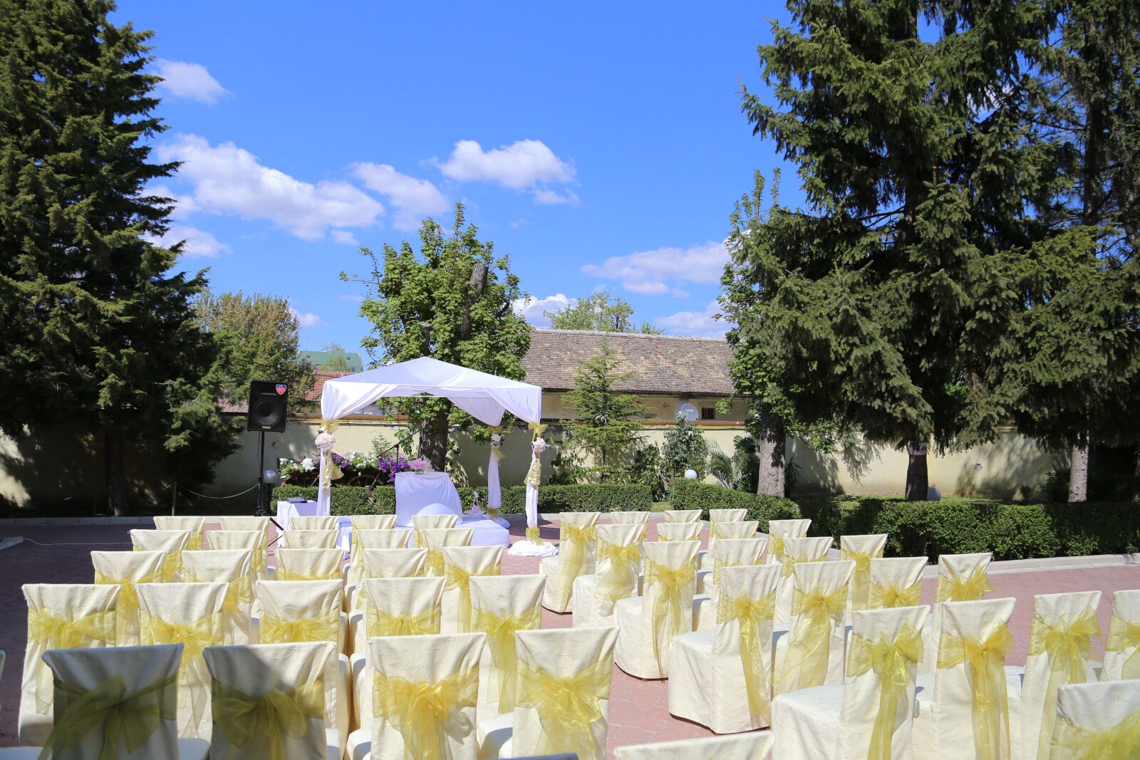 Canon EF 24-105mm F4L IS USM sample photo. Garden, wedding, decorative, chairs photography