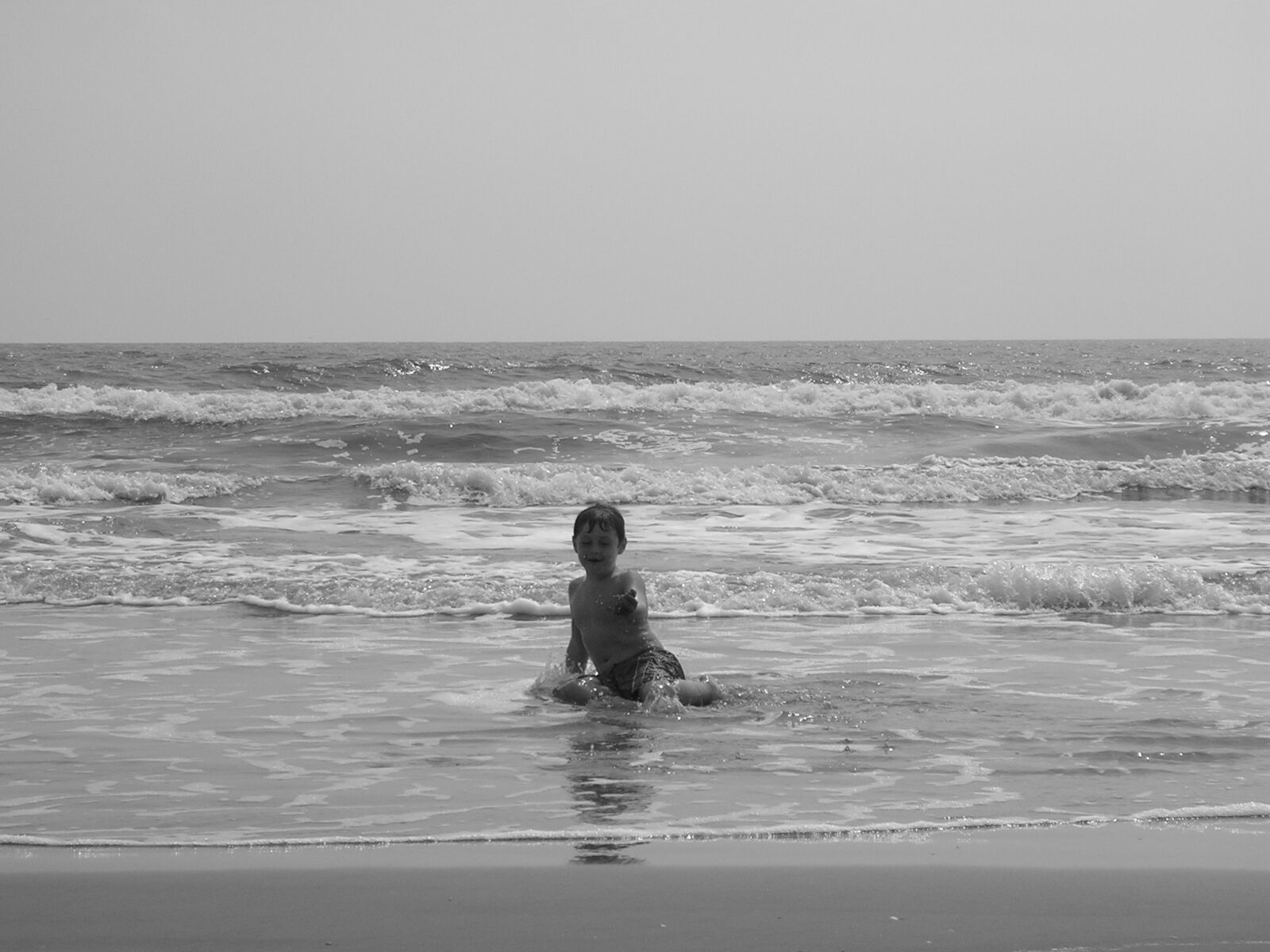 Nikon E3200 sample photo. Beach, boy, black and photography