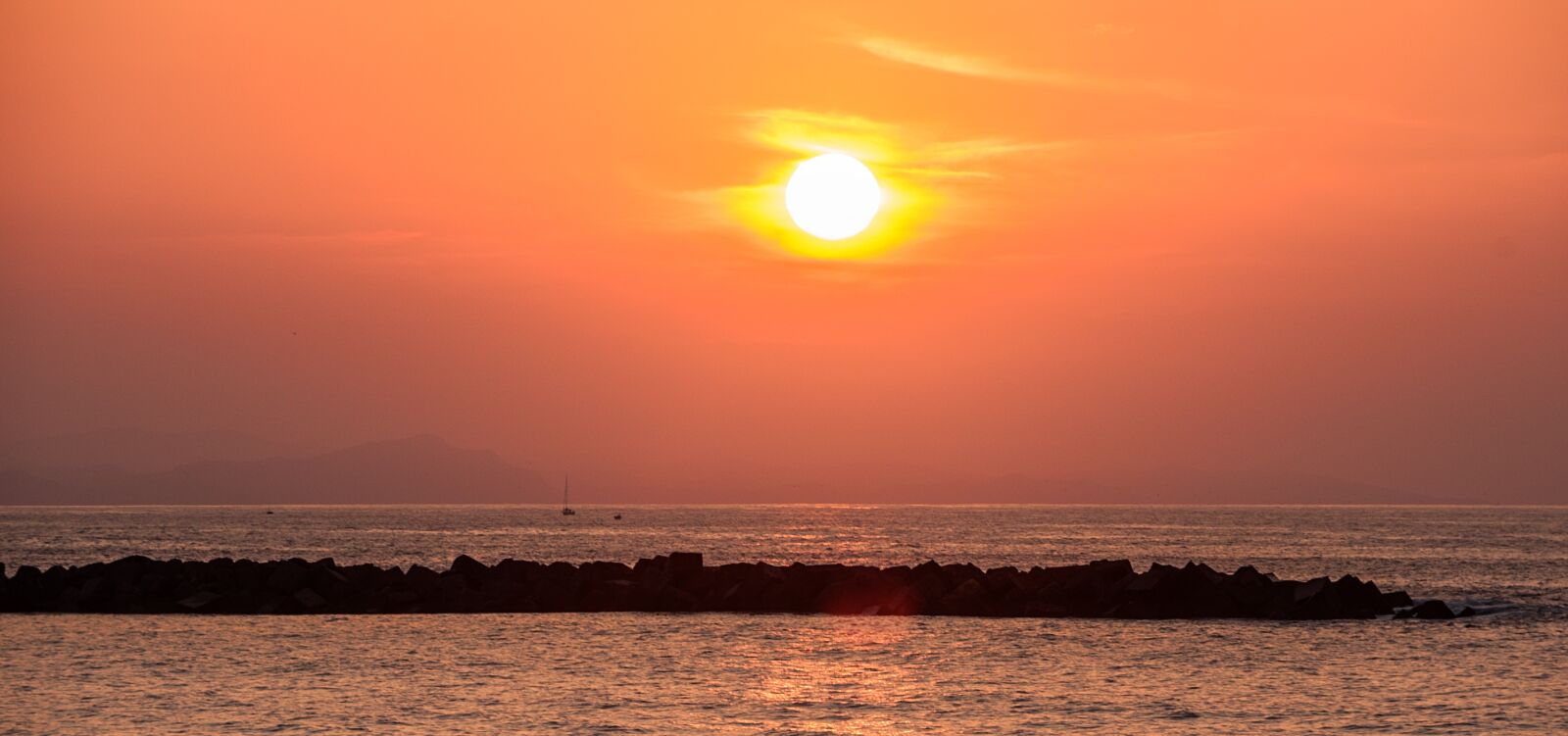 Nikon D700 sample photo. Sunset, puestasol, breakwater photography