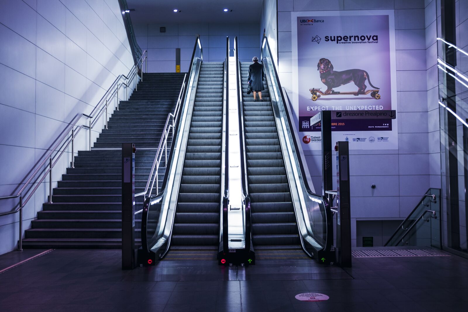 Fujifilm X100T sample photo. Escalators, person, solo photography