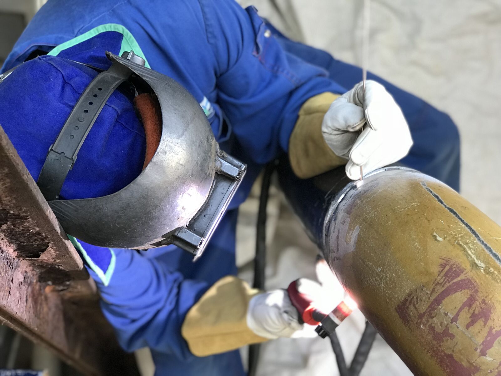 iPhone 7 Plus back dual camera 6.6mm f/2.8 sample photo. Welder, welding, industry photography