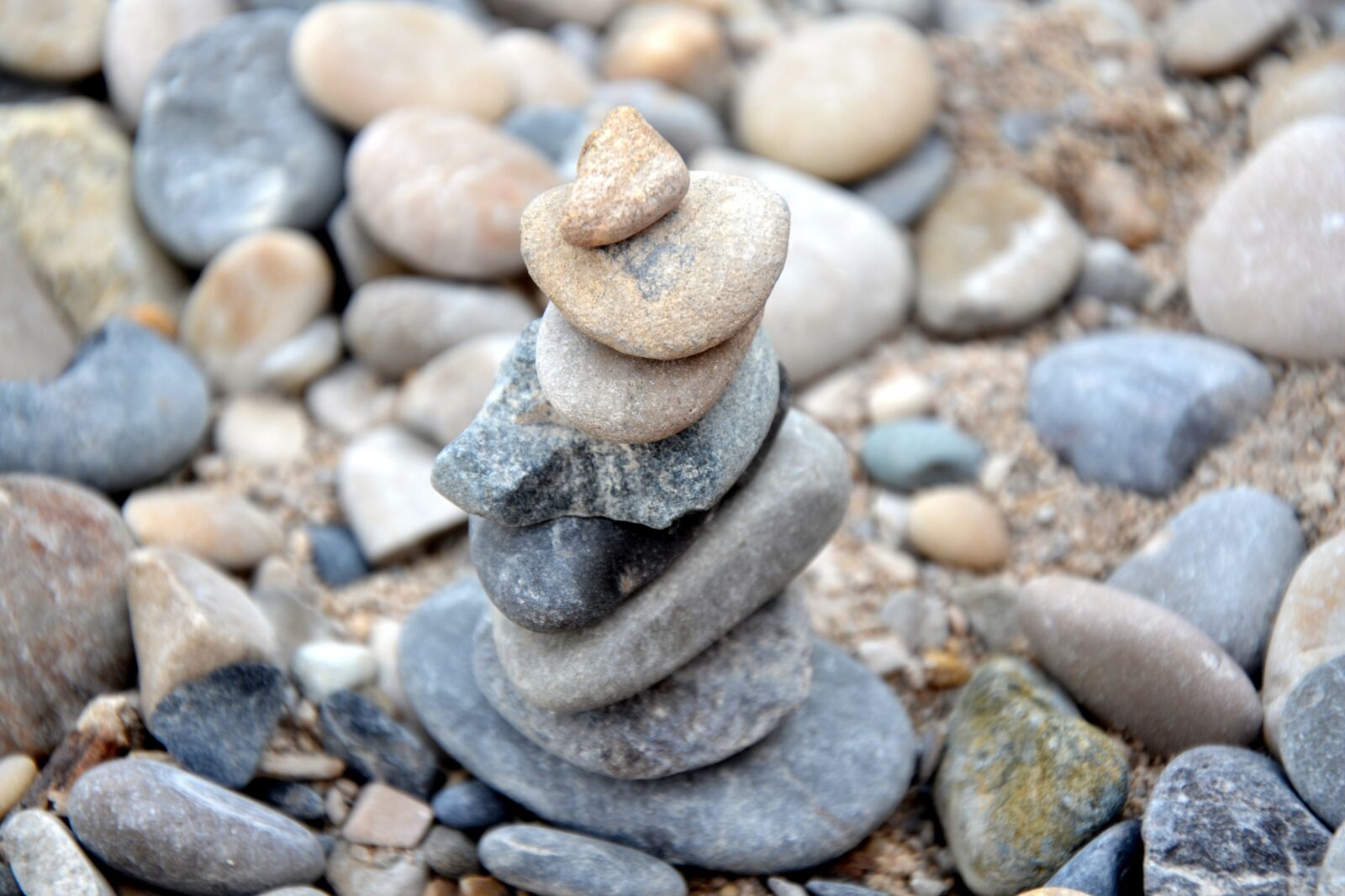 Nikon D3100 sample photo. Stones, beach, stacked photography