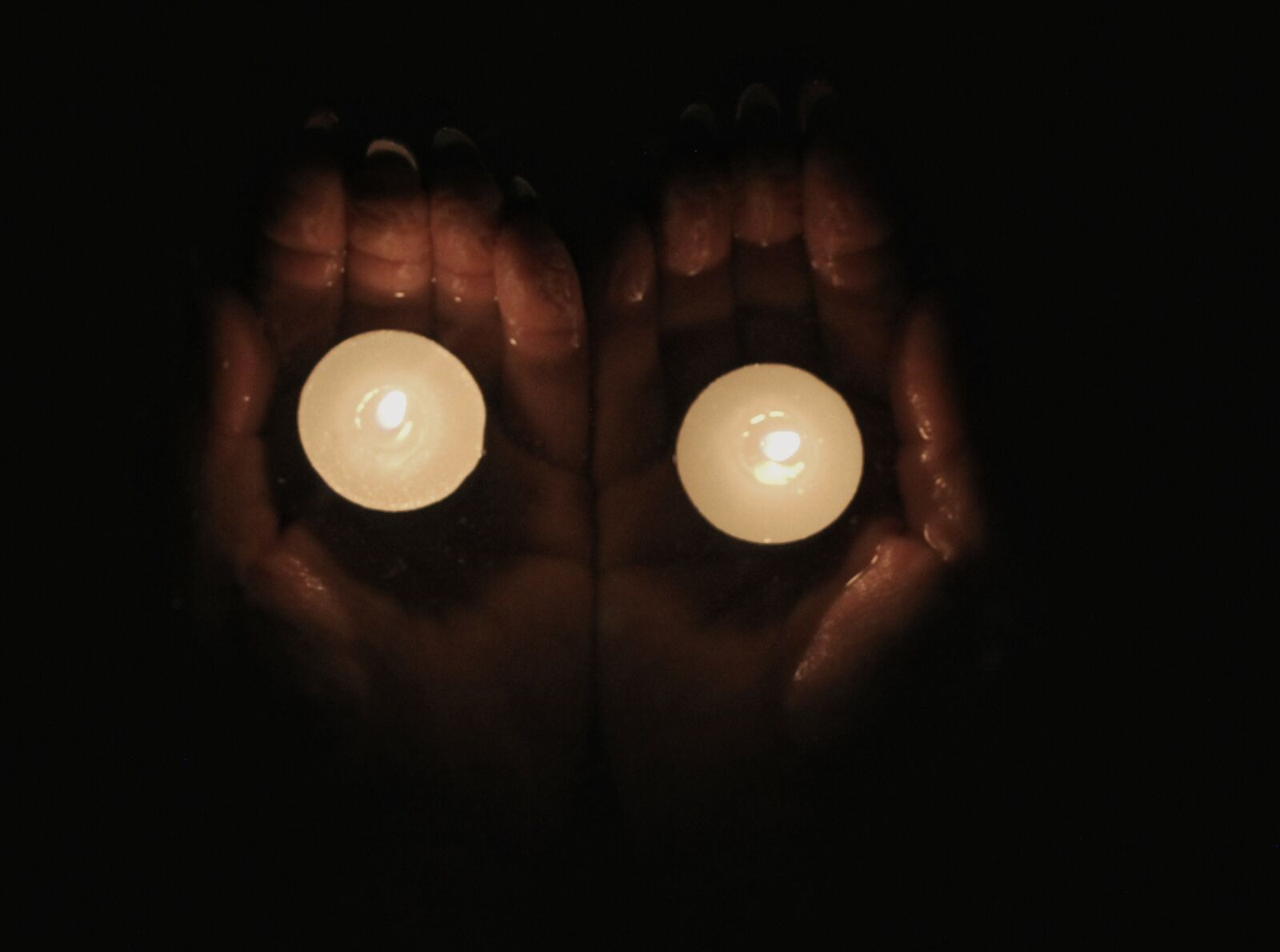 Canon EF 28-80mm f/3.5-5.6 sample photo. Candles, hand, black photography