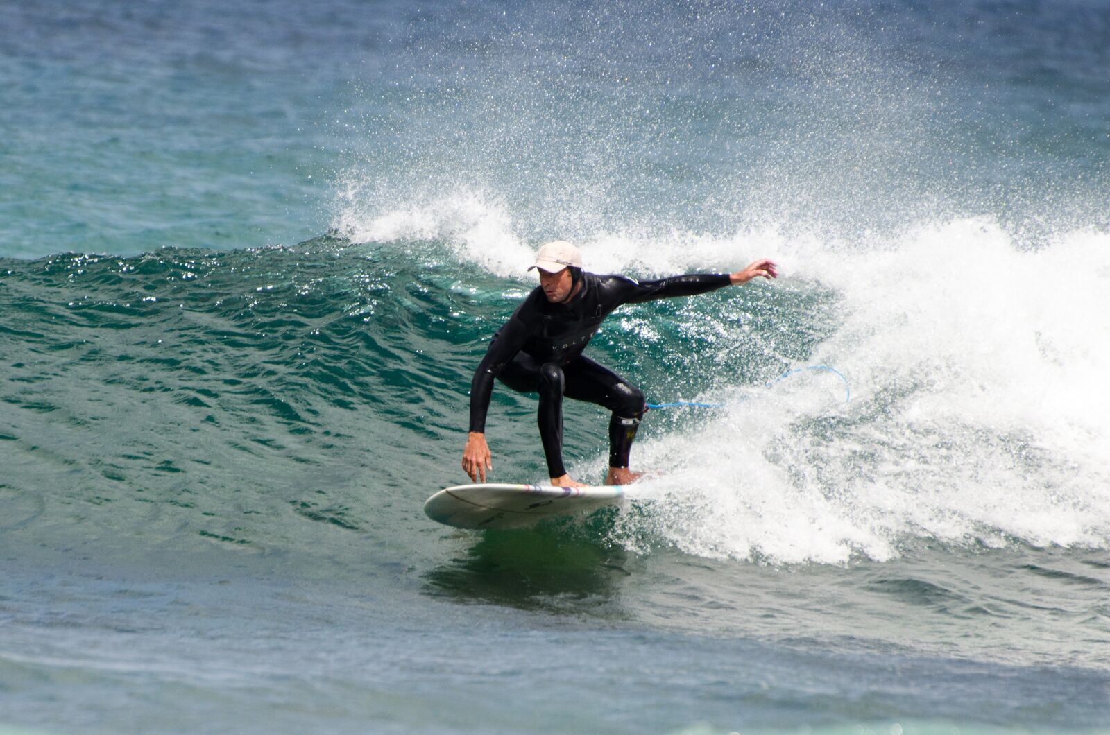 Nikon D5100 sample photo. Surfing, longboard, sun protection photography