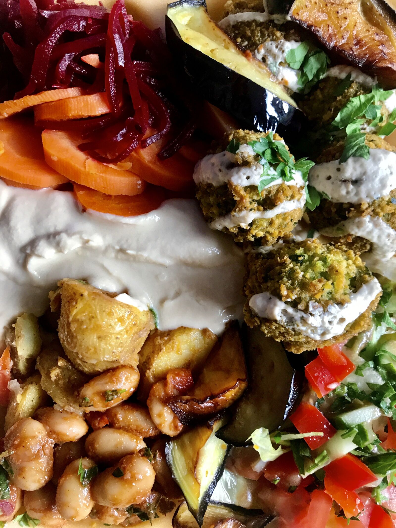 iPhone 7 back camera 3.99mm f/1.8 sample photo. Falafel plate, eat, oriental photography