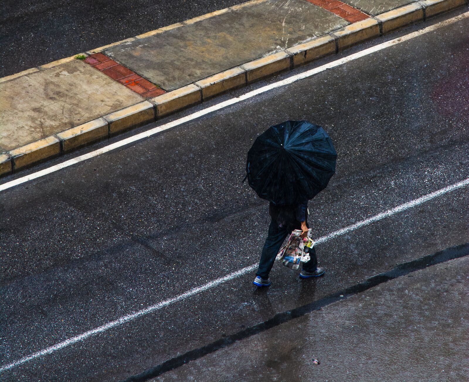 Nikon D5200 sample photo. Rain, man, street photography