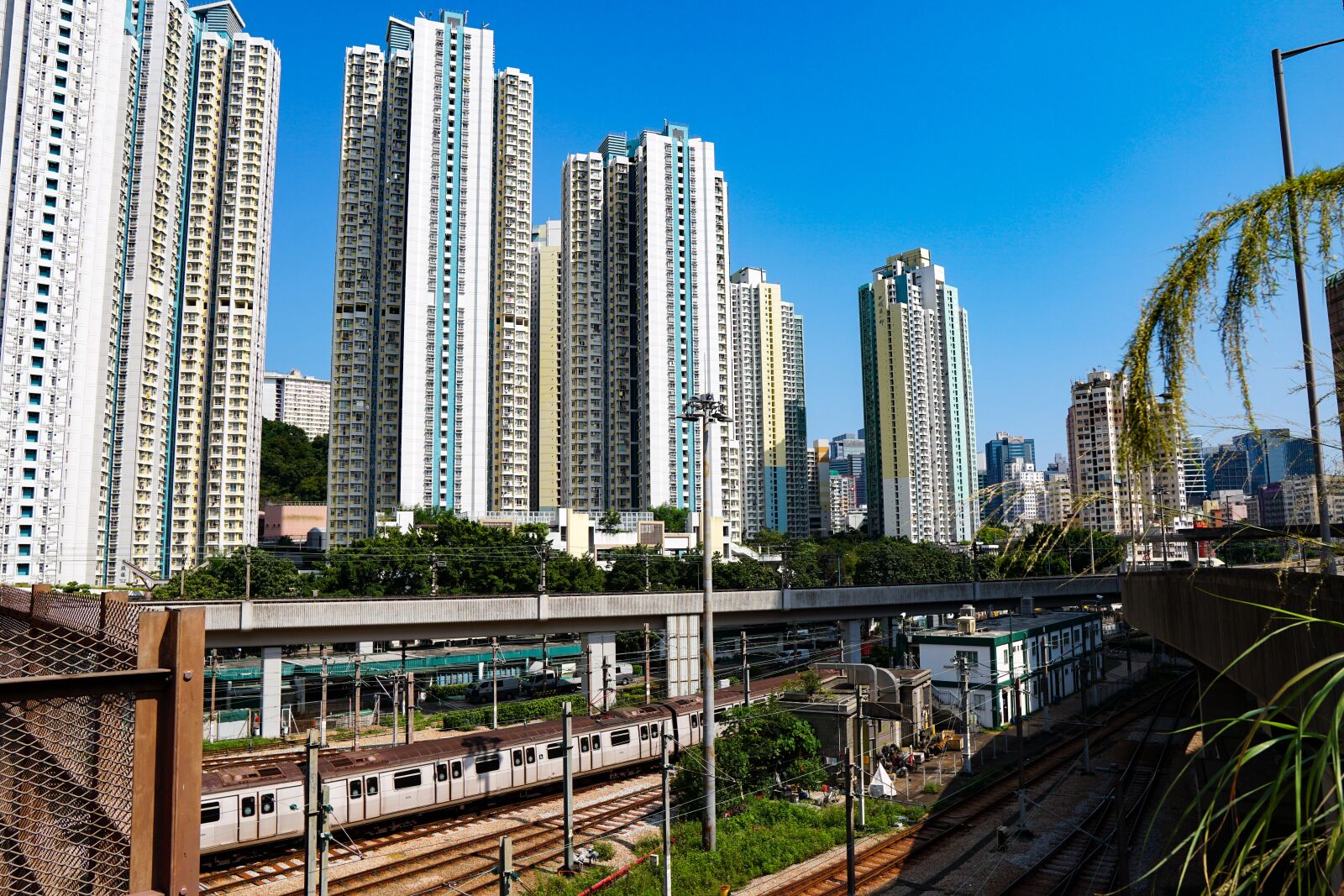 Sigma 16mm F1.4 DC DN | C sample photo. Apartment, hongkong, train photography