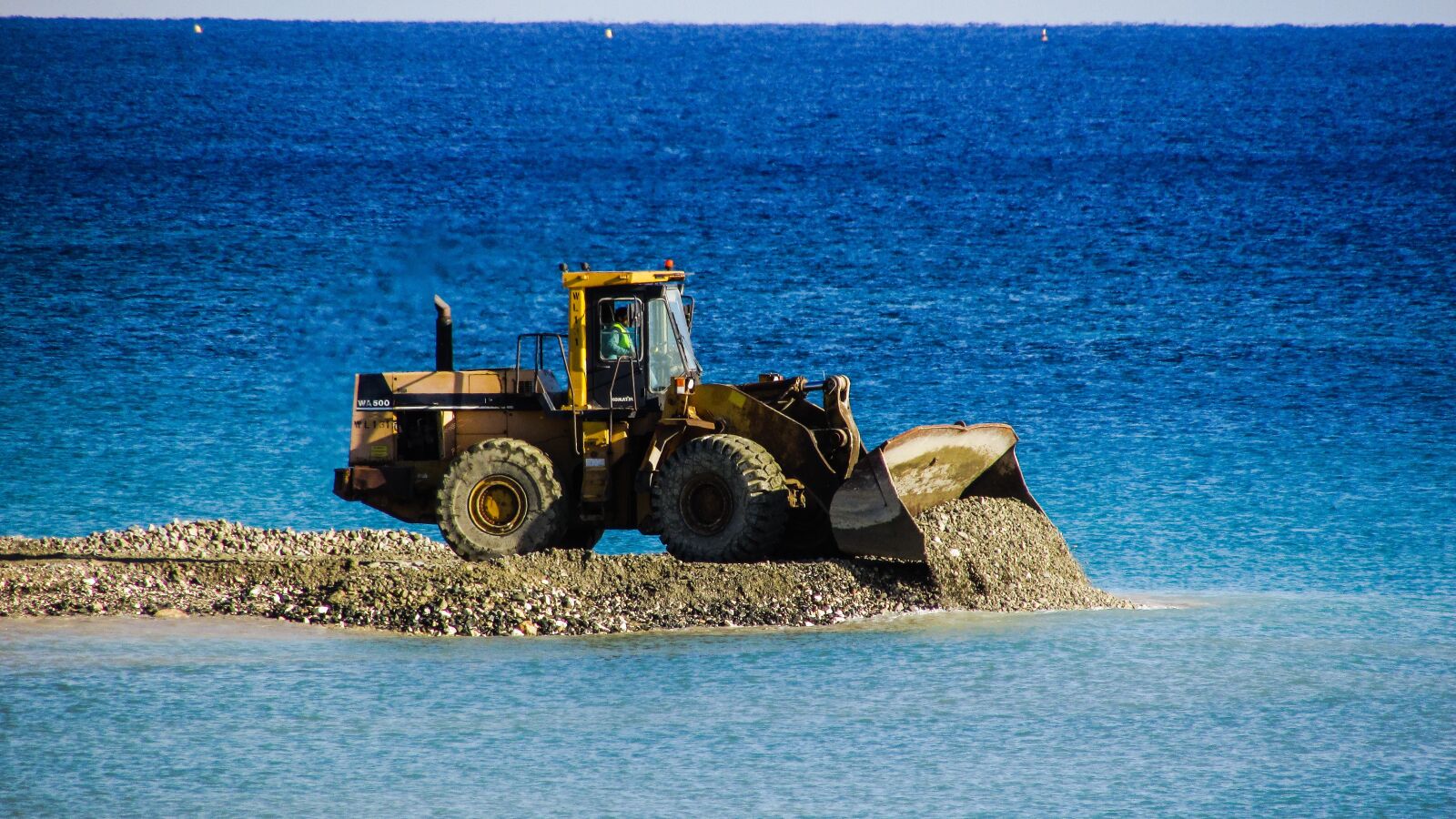Canon PowerShot SX400 IS sample photo. Bulldozer, unload, gravel photography