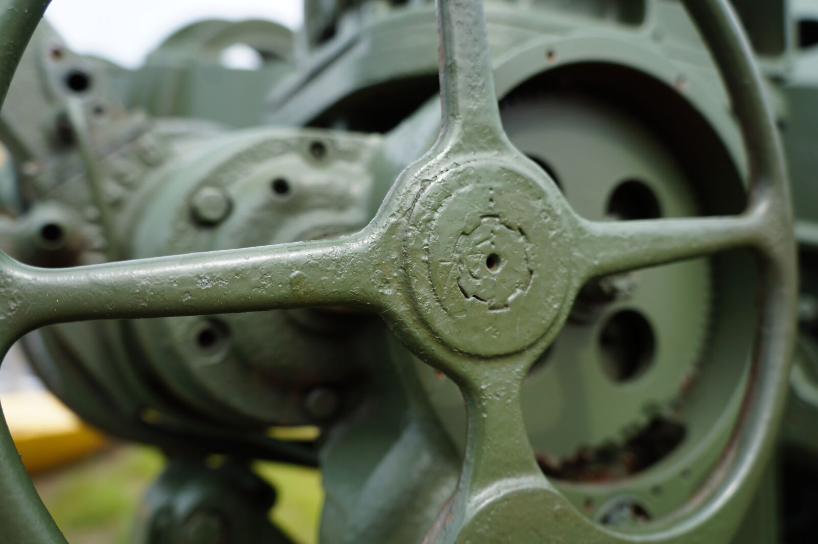 Sony Alpha a3000 + Sony E 18-55mm F3.5-5.6 OSS sample photo. Wheel, machine, industry photography