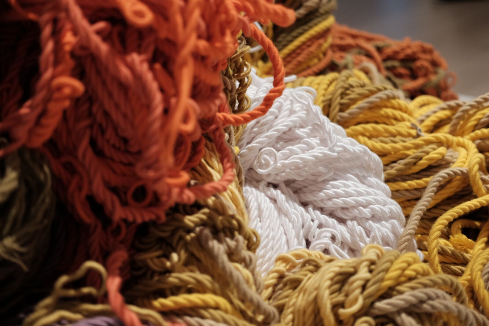 Fujifilm X-T1 + Fujifilm XF 35mm F2 R WR sample photo. Yarn, fabric, orange photography