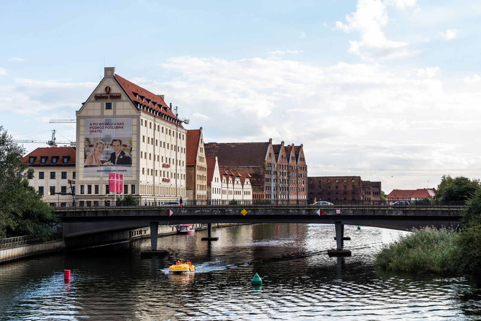 Canon EOS 6D + Canon EF 50mm F1.4 USM sample photo. Architecture, buildings, city, clouds photography