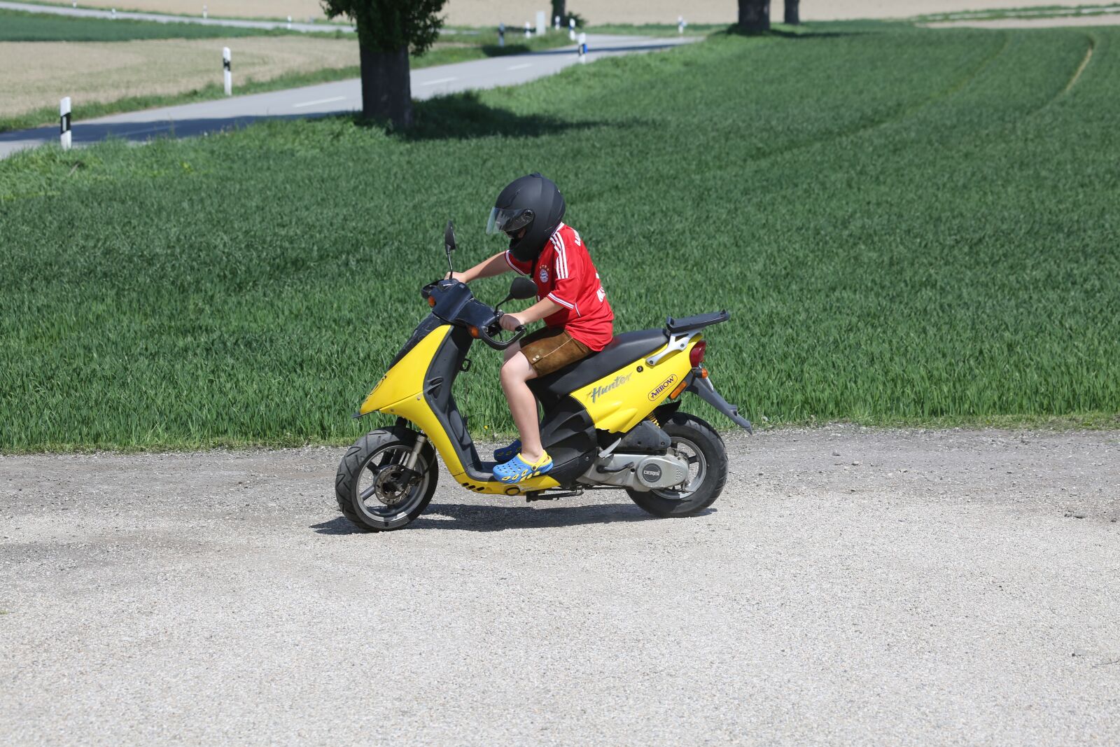 Canon EF 100-400mm F4.5-5.6L IS USM sample photo. Roller, moped, driver photography