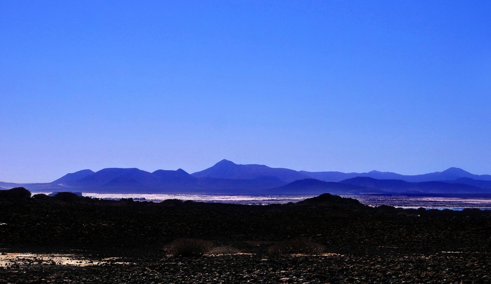 Panasonic Lumix DMC-GX85 (Lumix DMC-GX80 / Lumix DMC-GX7 Mark II) sample photo. Canary islands, volcanoes, blue photography