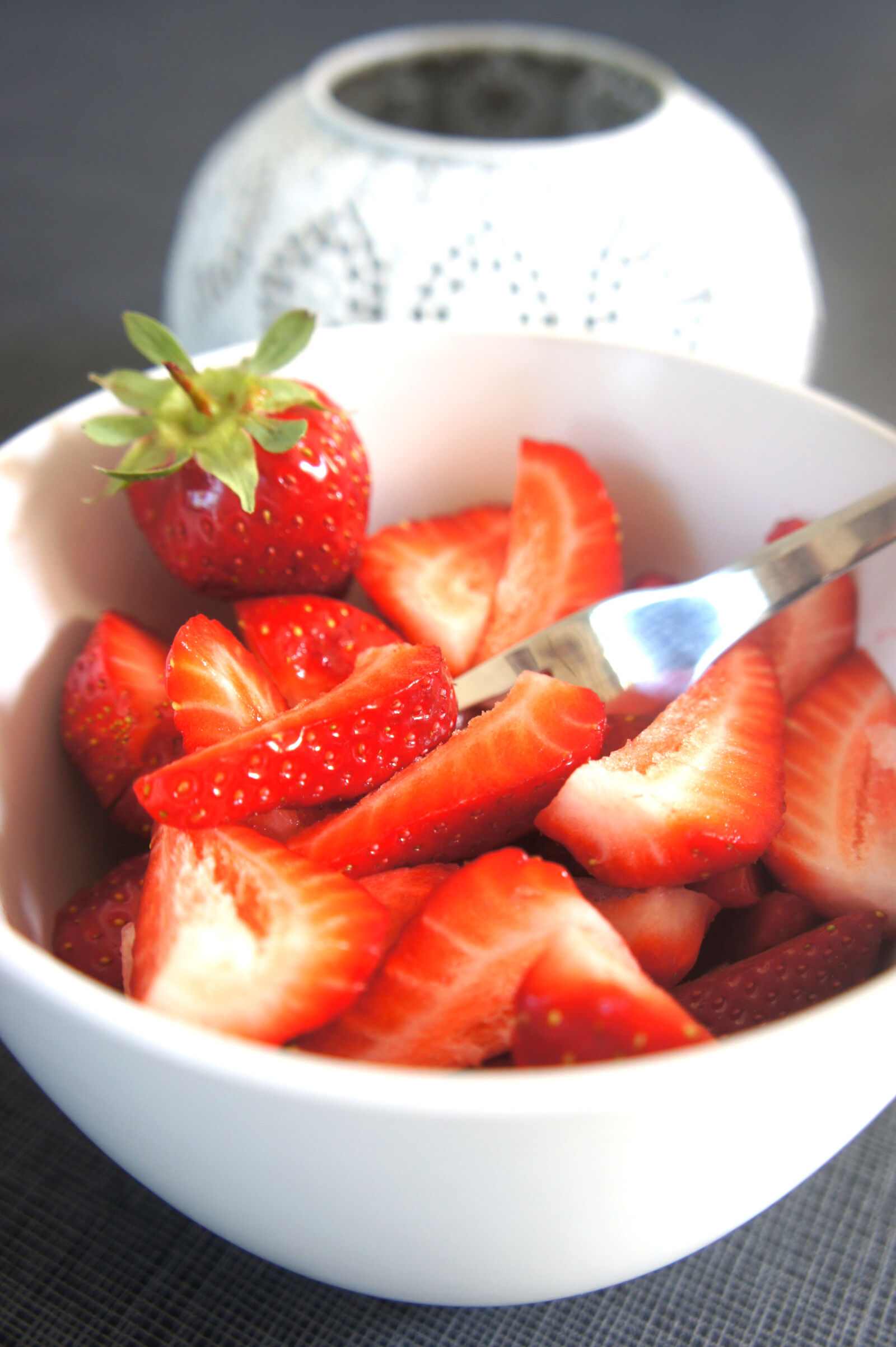 Sony E 18-55mm F3.5-5.6 OSS sample photo. Chopped, strawberry, in, bowl photography