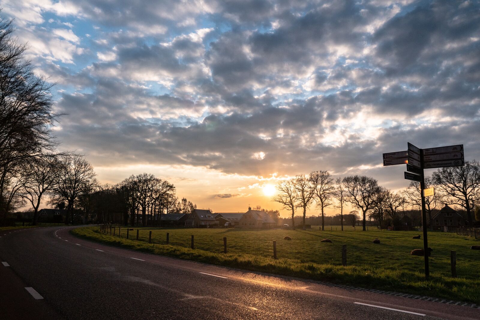 Sony a6300 sample photo. Streetsign, clouds, road photography