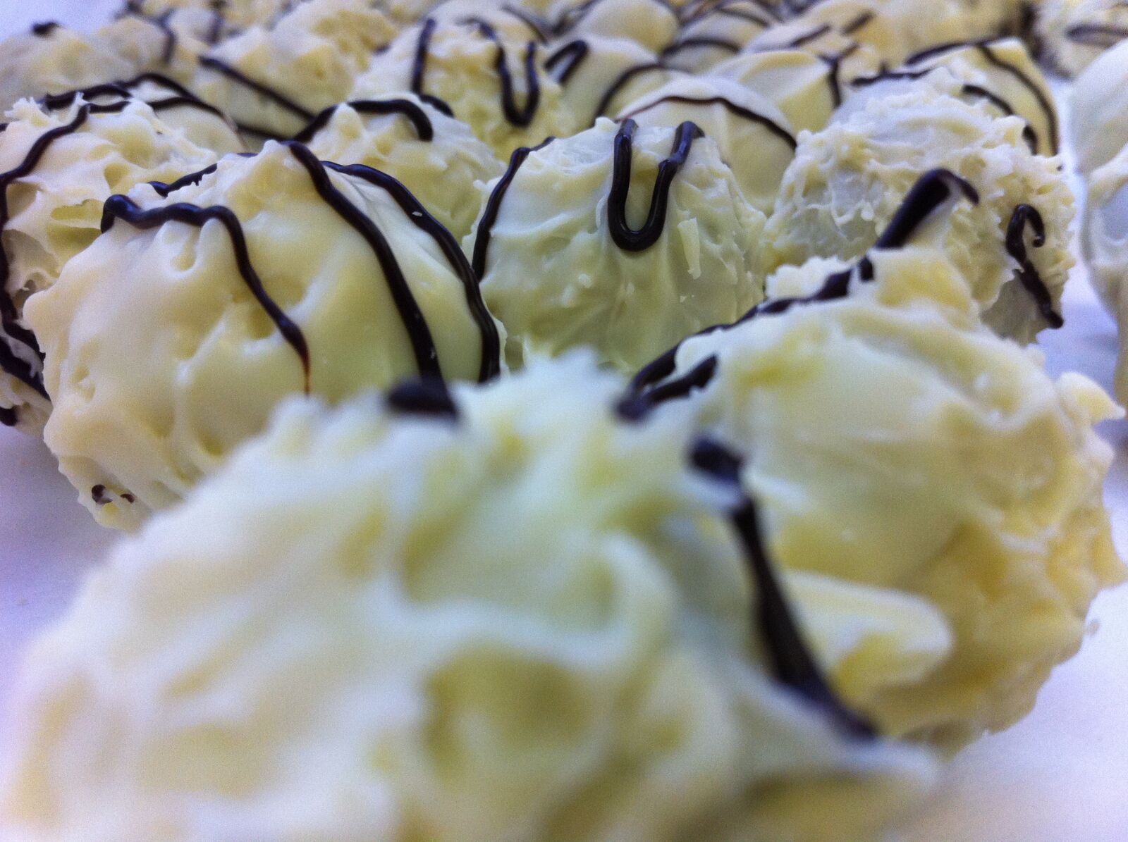 Apple iPhone 4 sample photo. Truffles, white chocolates, chocolate photography