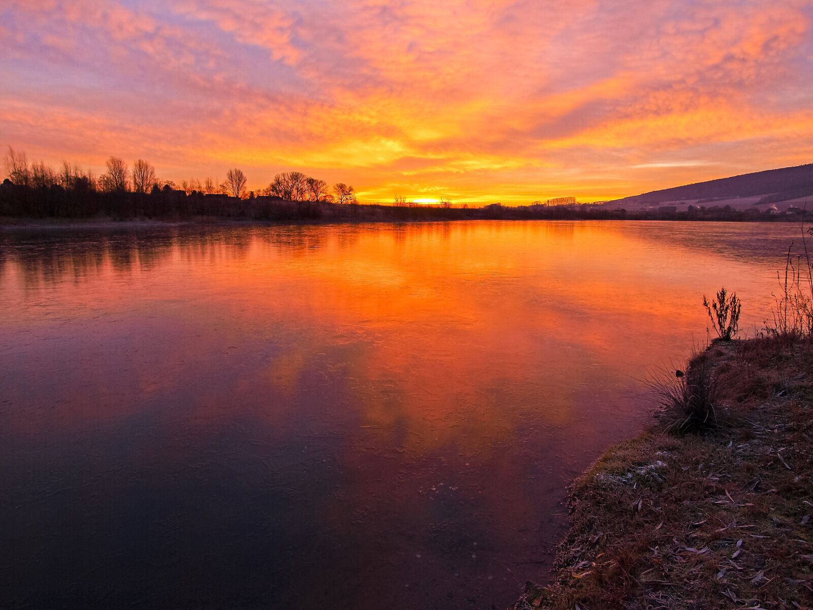 OLYMPUS 11-22mm Lens sample photo. Gravel pond, pond, water photography