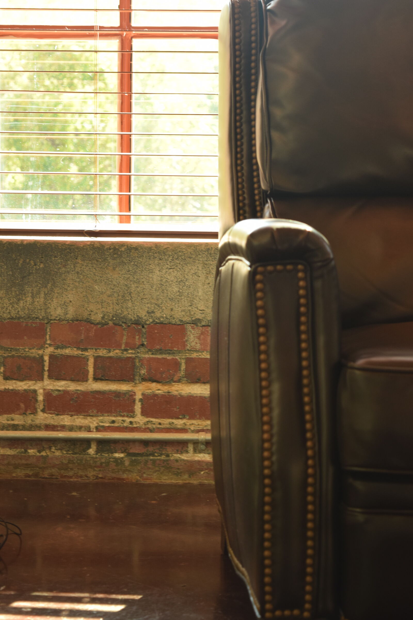 Nikon D3300 sample photo. Brick, chair, leather, rustic photography