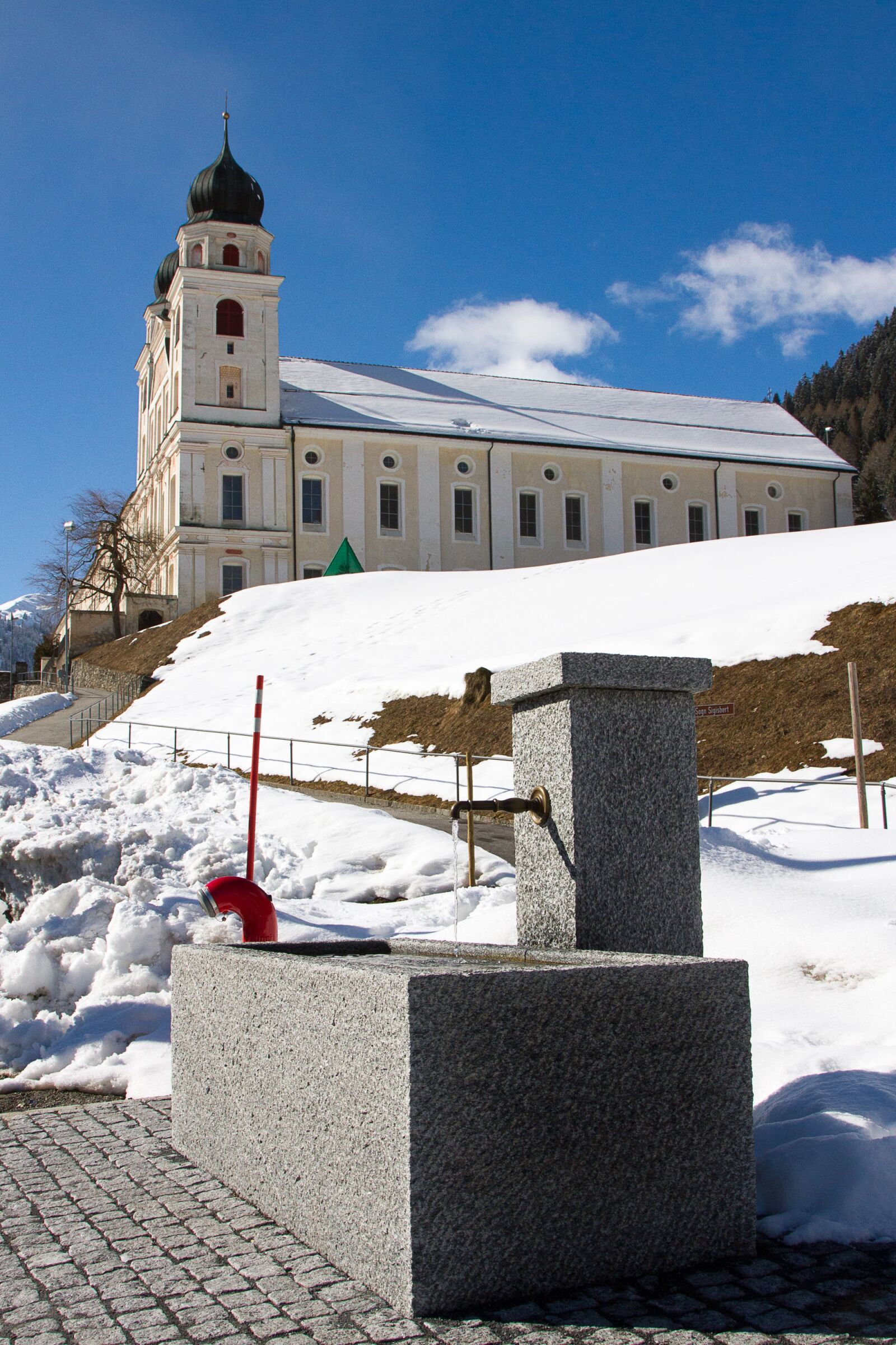 Canon EOS 7D + Canon EF 24-105mm F4L IS USM sample photo. Disentis, winter, church photography