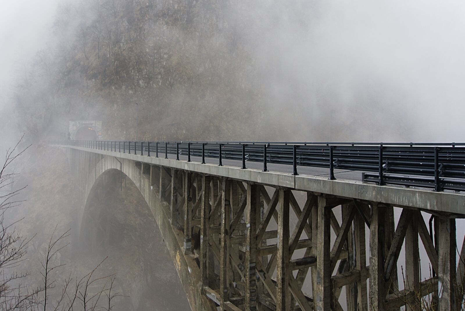 Sony E 18-50mm F4-5.6 sample photo. Bridge, fog, roads photography