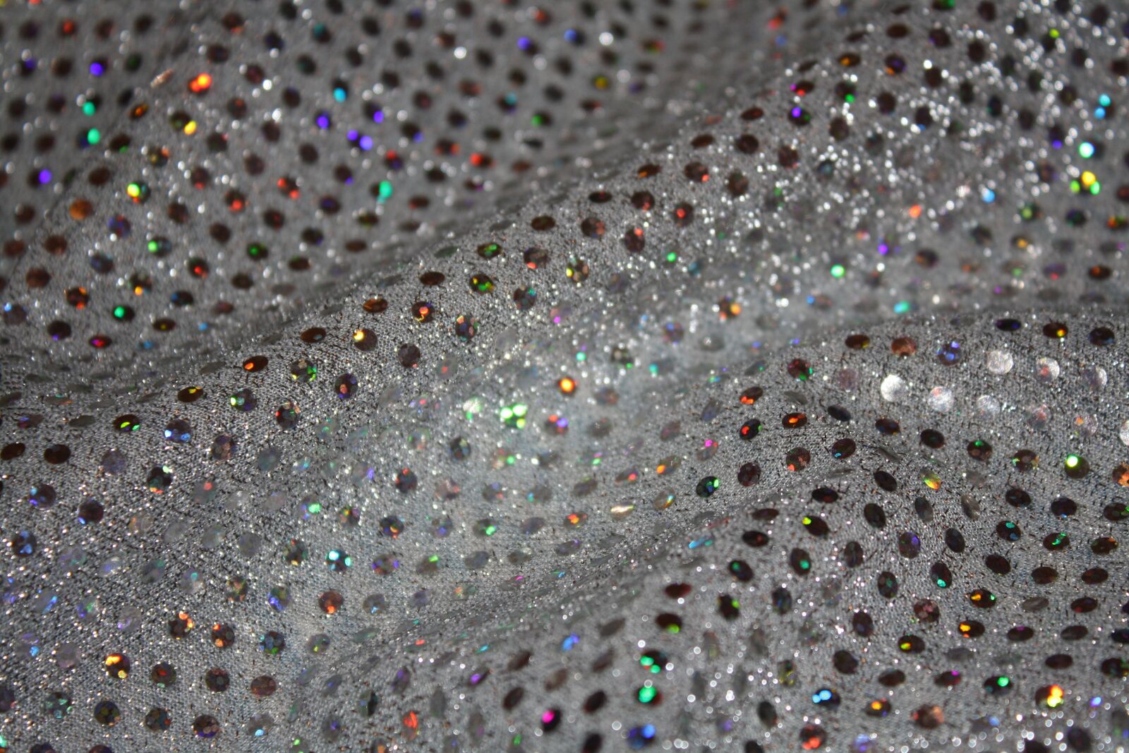 Canon EOS 1000D (EOS Digital Rebel XS / EOS Kiss F) sample photo. Fabric, sequin, silver photography