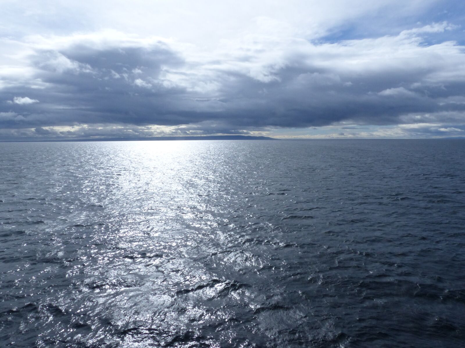Panasonic Lumix DMC-FZ200 sample photo. Sea, sky, blue photography