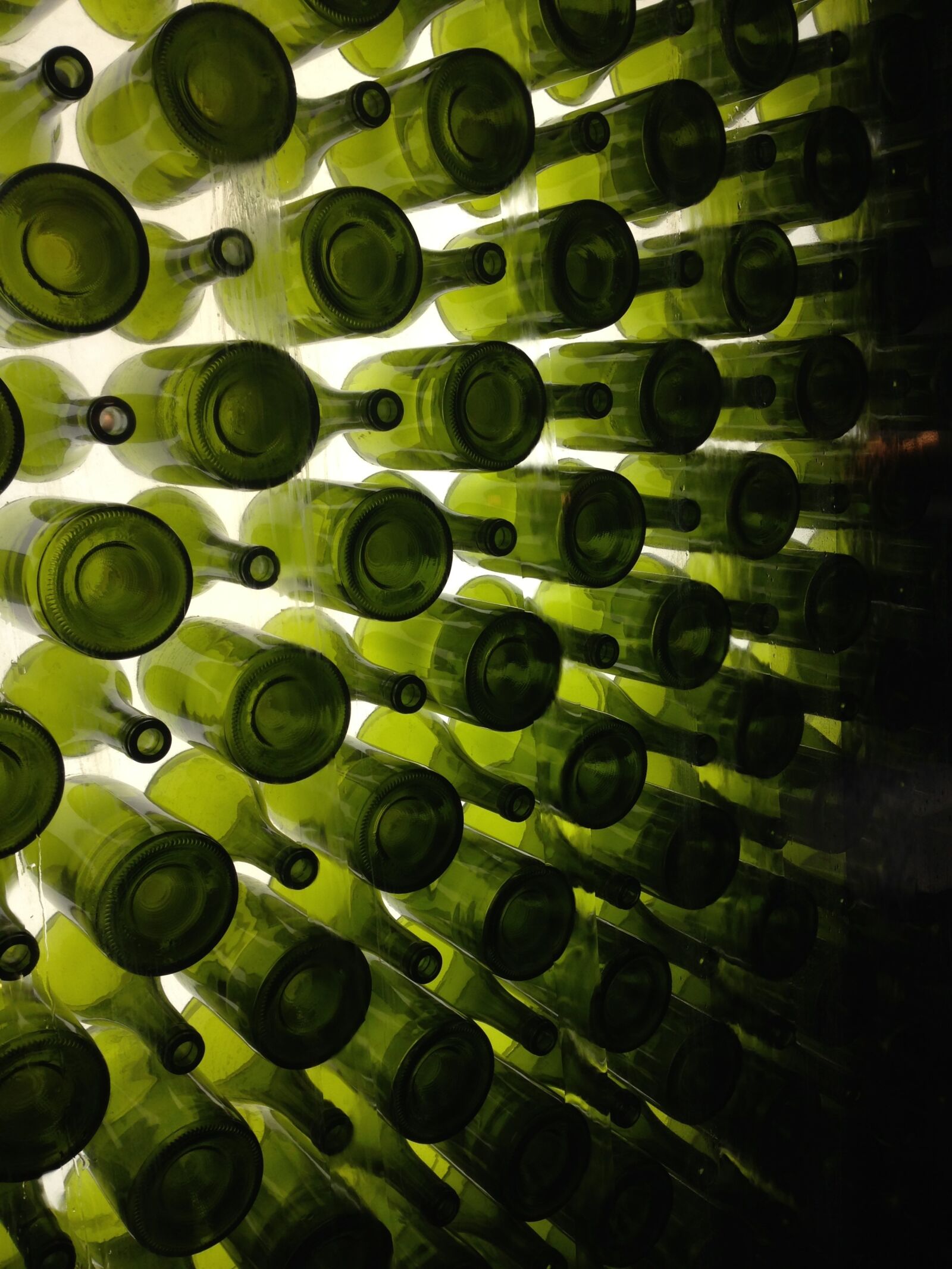 iPhone 5 back camera 4.12mm f/2.4 sample photo. Bottles, green, wine photography