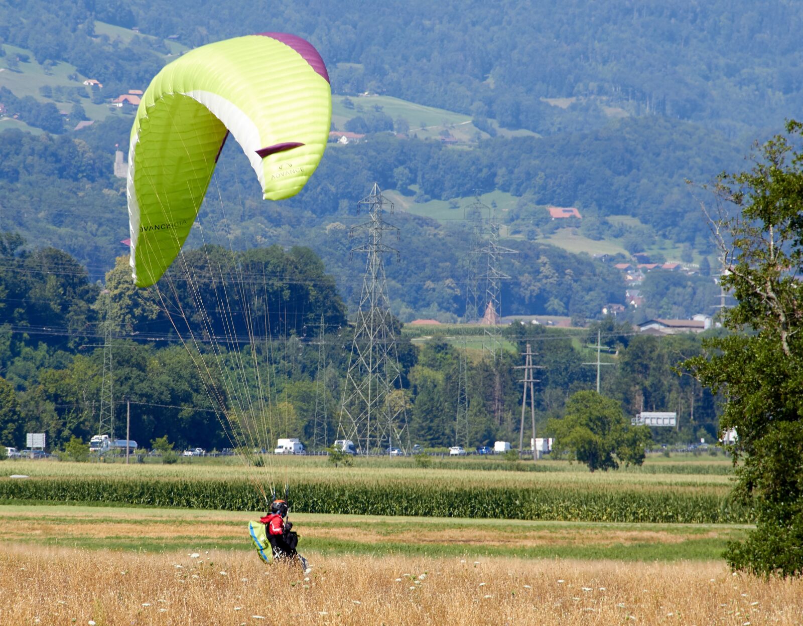 Canon EOS 60D sample photo. Paragliding, land, man photography