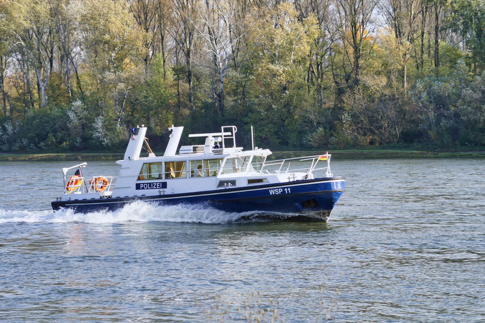 Sony a6500 + Sony E 55-210mm F4.5-6.3 OSS sample photo. Police boat, police, water photography