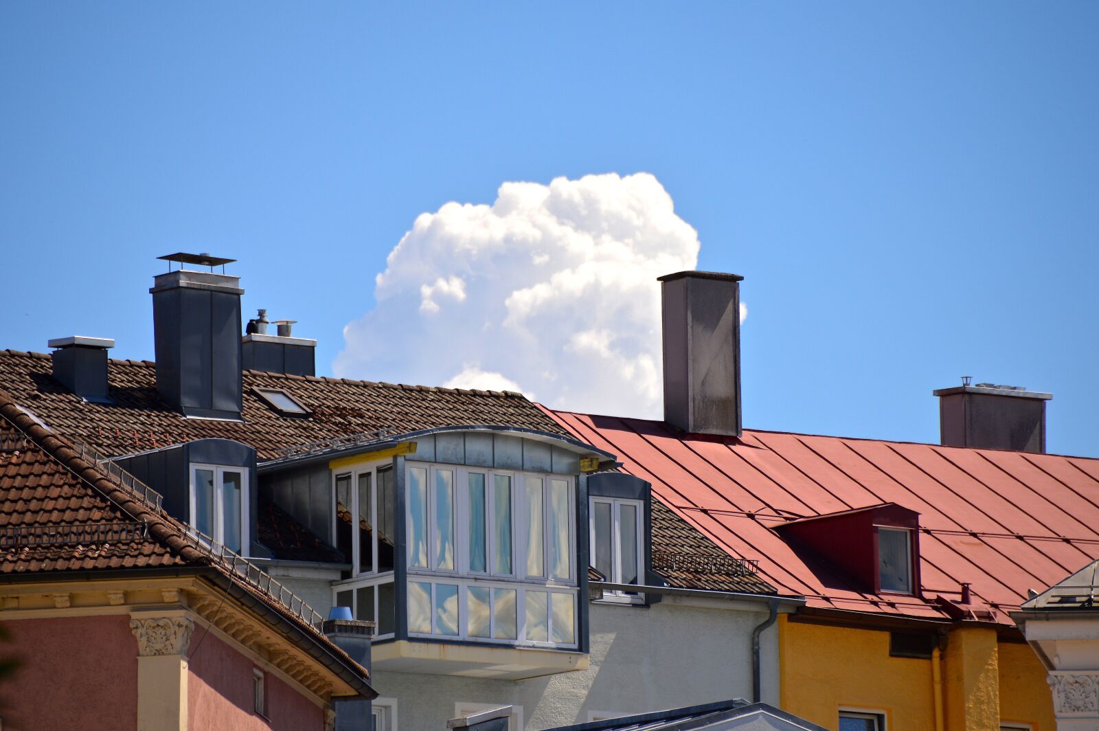 Nikon D3200 sample photo. Architecture, cloud, roofs photography