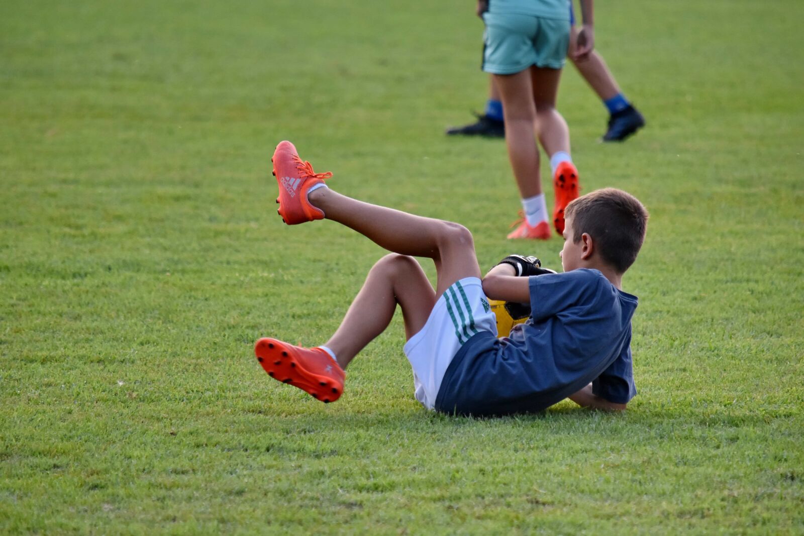 Nikon D5500 sample photo. Child, defensive, football player photography