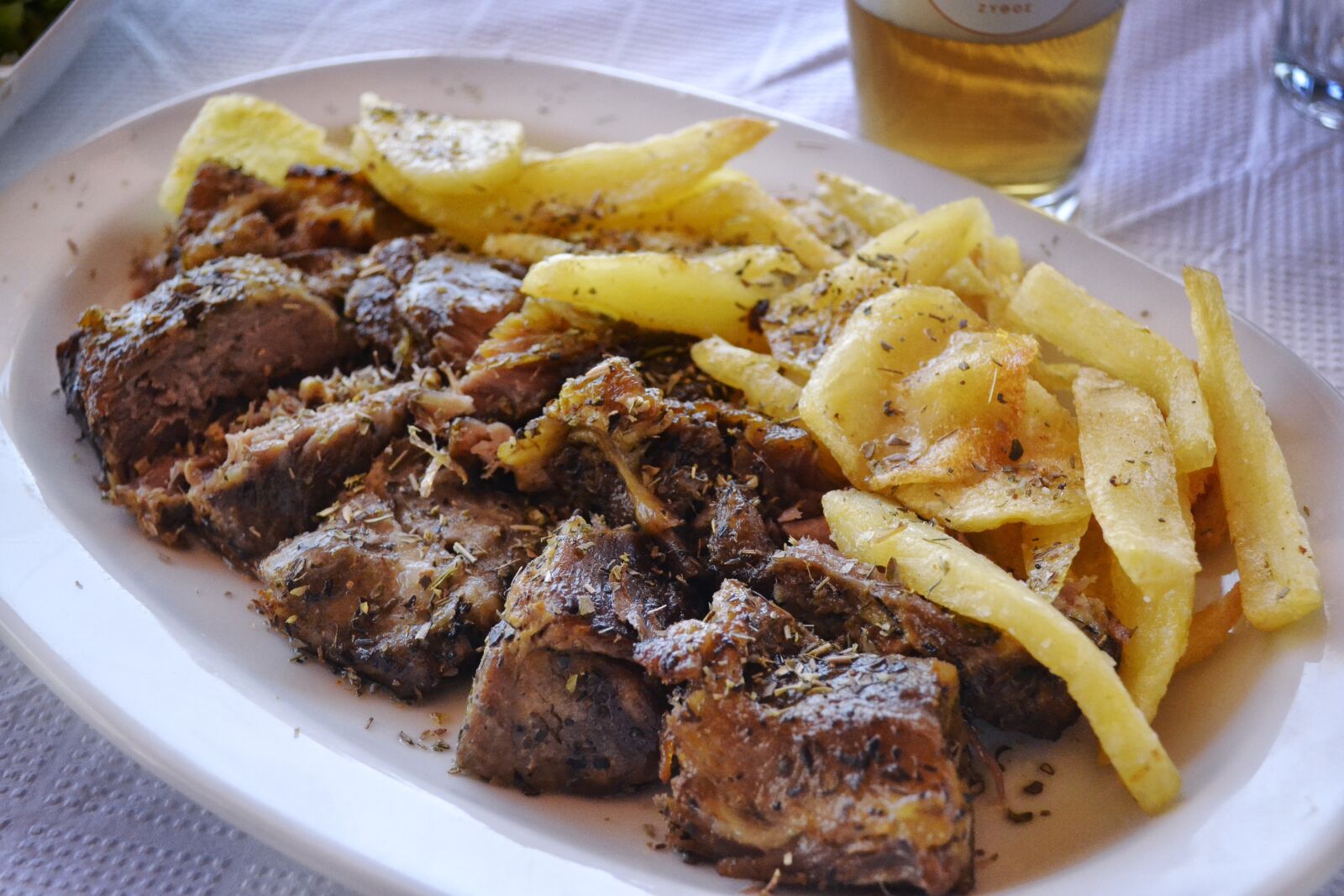 Nikon D3100 sample photo. Meat and chips, plated photography