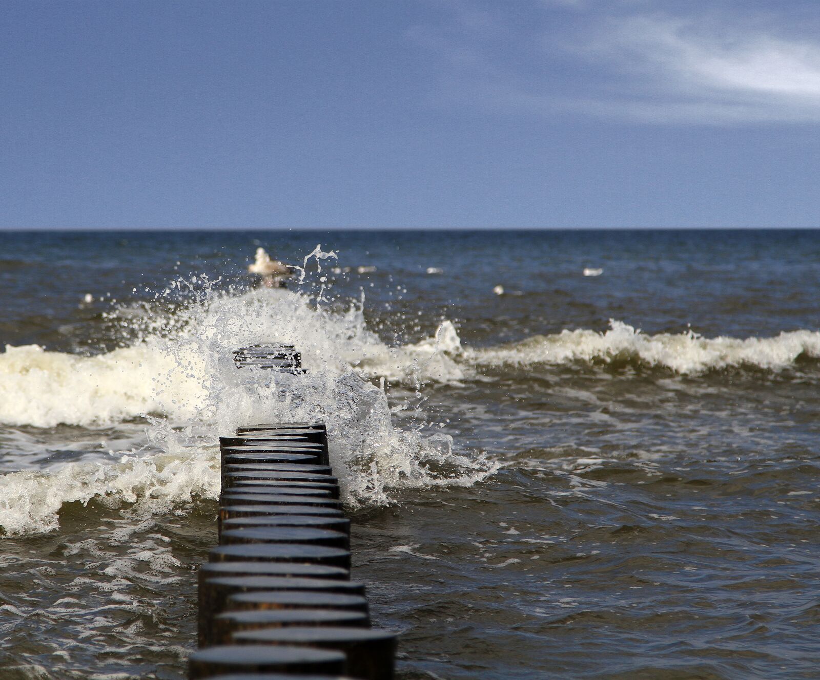 Canon EOS 7D + Canon EF 24-105mm F4L IS USM sample photo. Breakwater, wave, spray photography