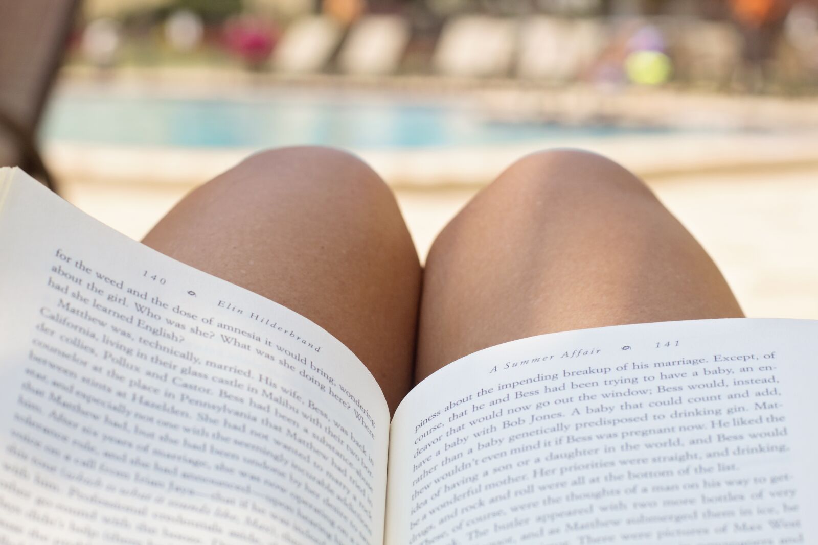 Canon EF 50mm F1.4 USM sample photo. Pool, reading, book photography