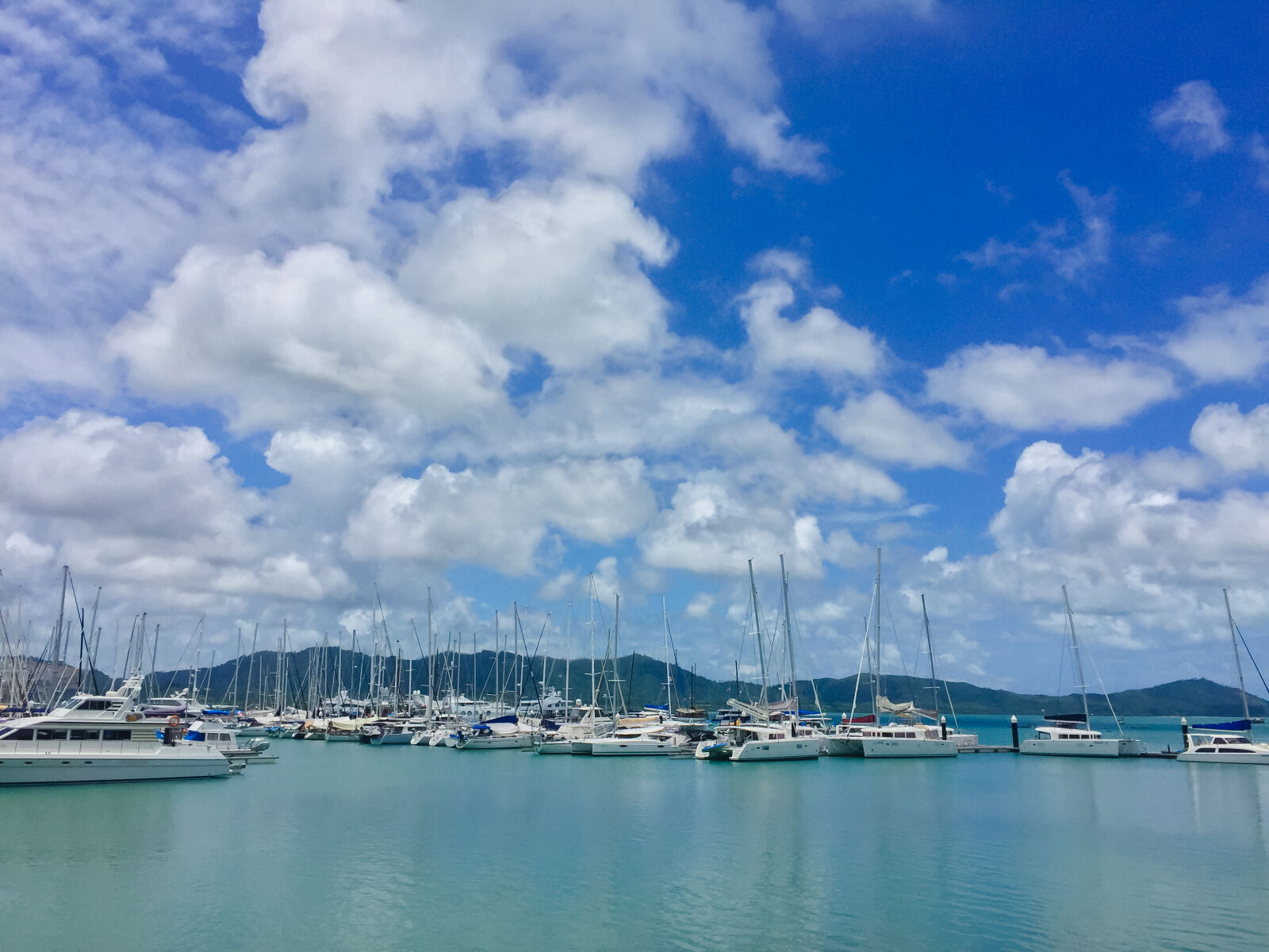 iPhone 6 Plus back camera 4.15mm f/2.2 sample photo. Bay, blue, boats, calm photography