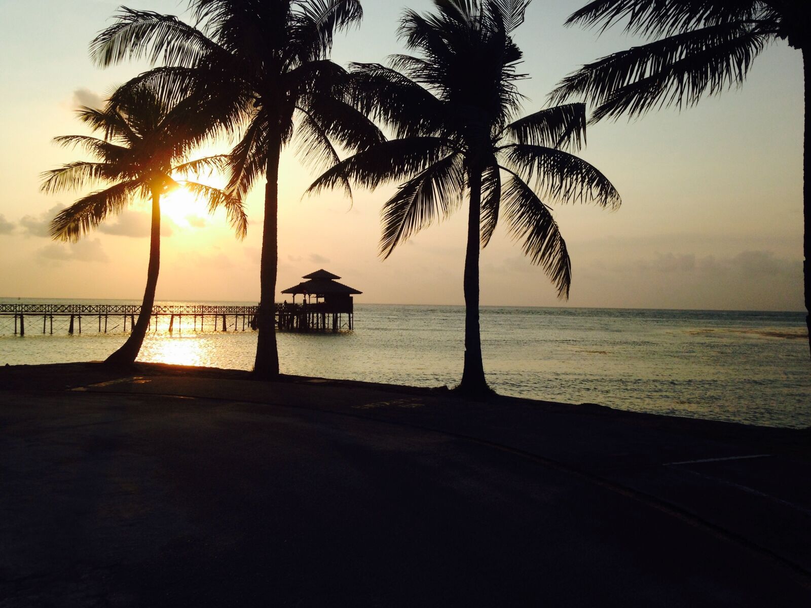 Apple iPhone 5c sample photo. Sunset, jetty, beach photography