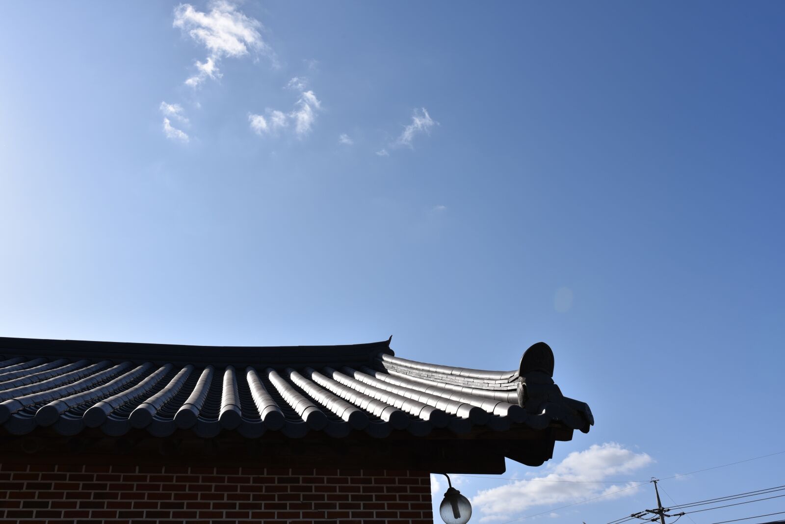 Nikon D750 sample photo. Build, sky, blue photography