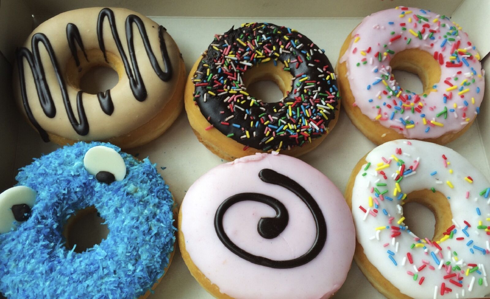 Apple iPhone 5s sample photo. Doughnuts, variety, donuts photography