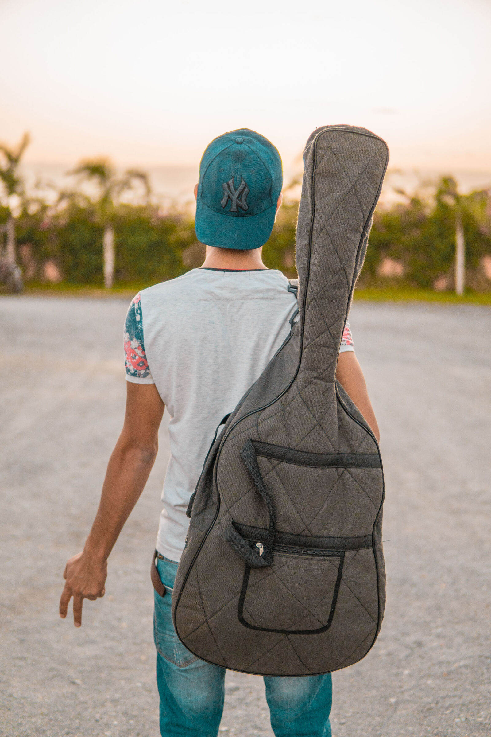 Sony a6300 + 30mm F1.4 DC DN | Contemporary 016 sample photo. Boy, fashion, guitar, guitarist photography